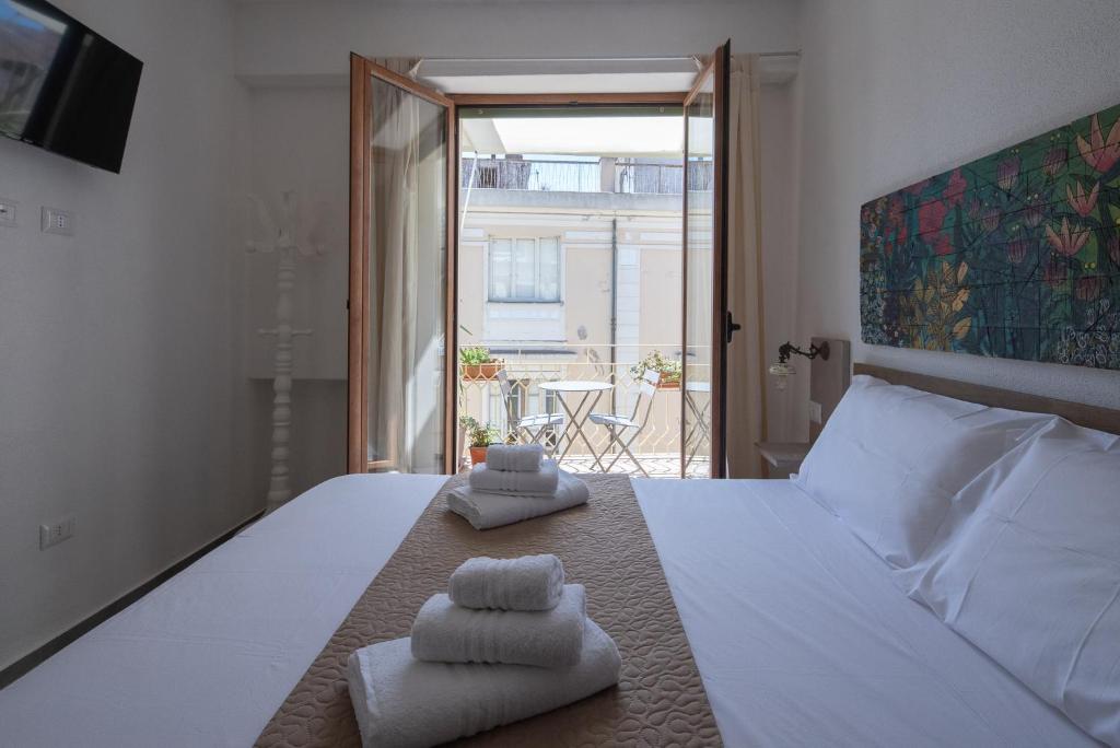 Ένα ή περισσότερα κρεβάτια σε δωμάτιο στο Sul Corso Affittacamere