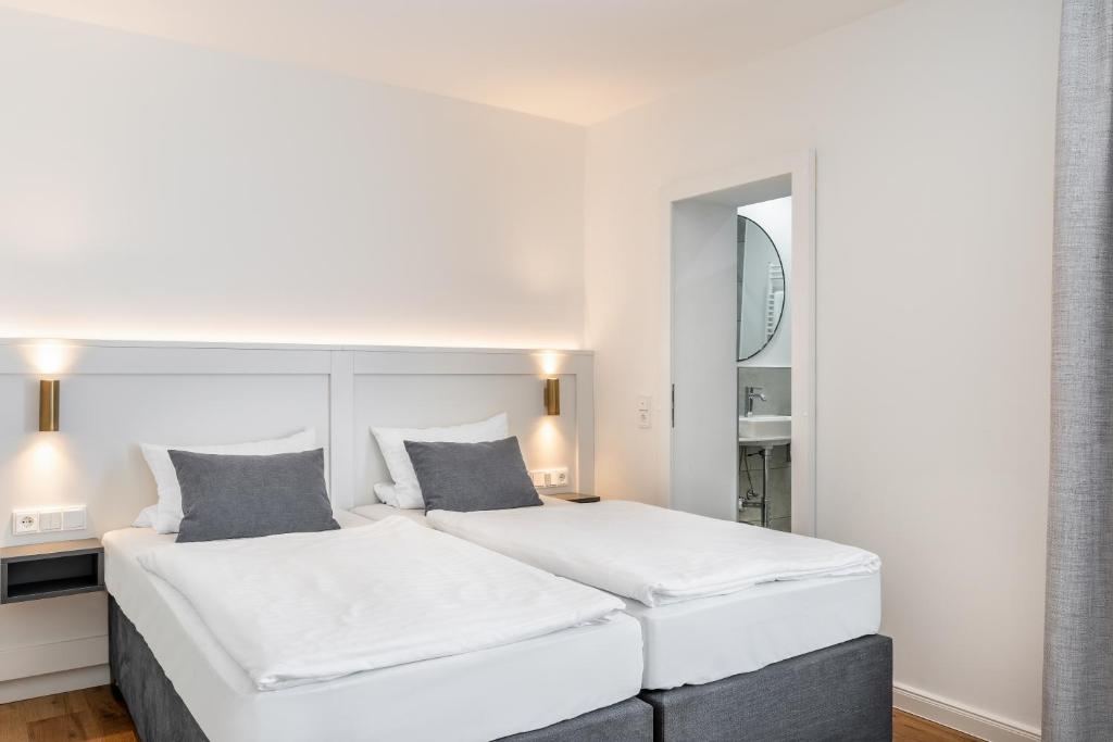 Postel nebo postele na pokoji v ubytování Hotel Bad Minden
