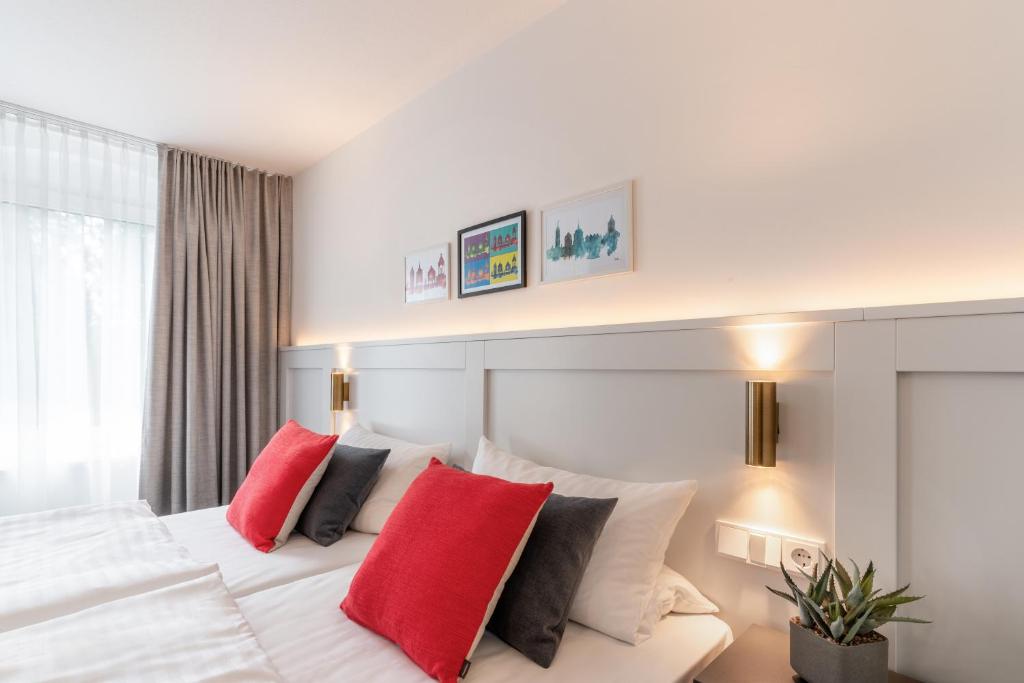 Postel nebo postele na pokoji v ubytování Hotel Bad Minden