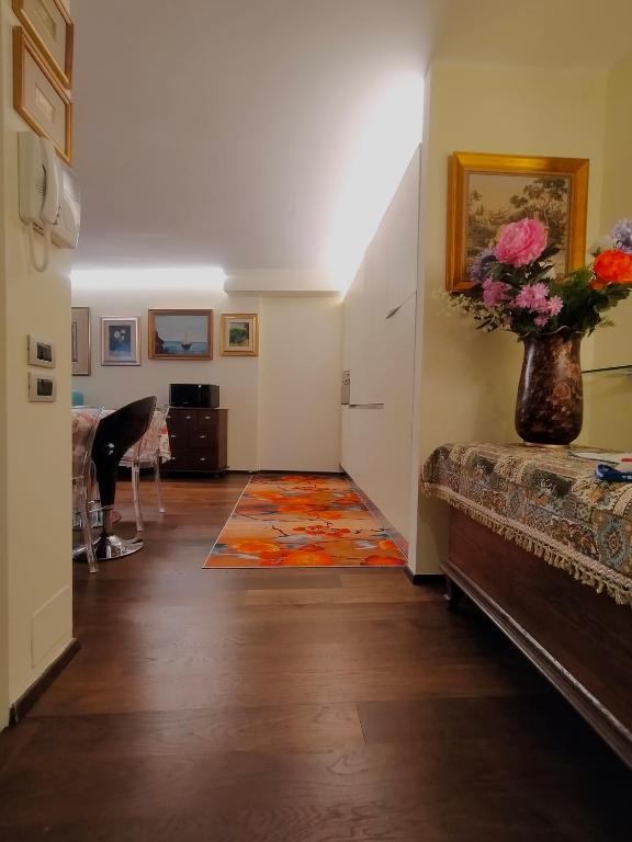 A television and/or entertainment centre at Verona City San Zeno Apartment