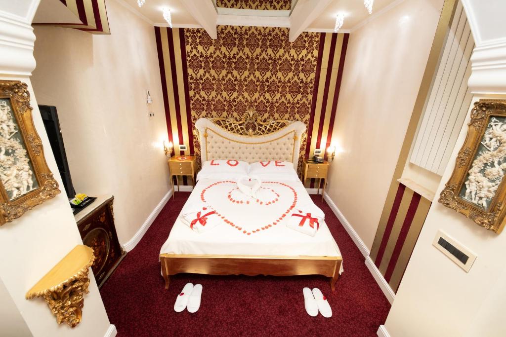 Posteľ alebo postele v izbe v ubytovaní Erossuite GuestHouse