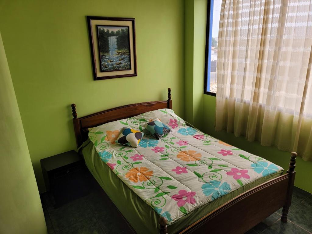 Postel nebo postele na pokoji v ubytování Hostal Haziel