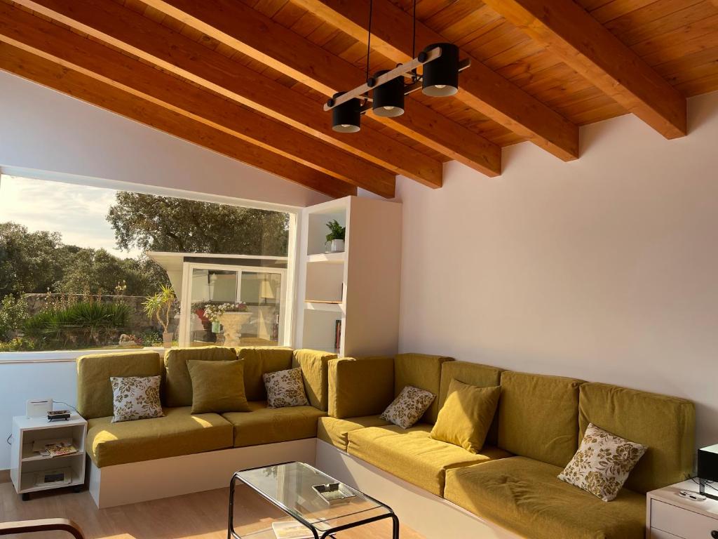 Posezení v ubytování Villa Entre Encinas