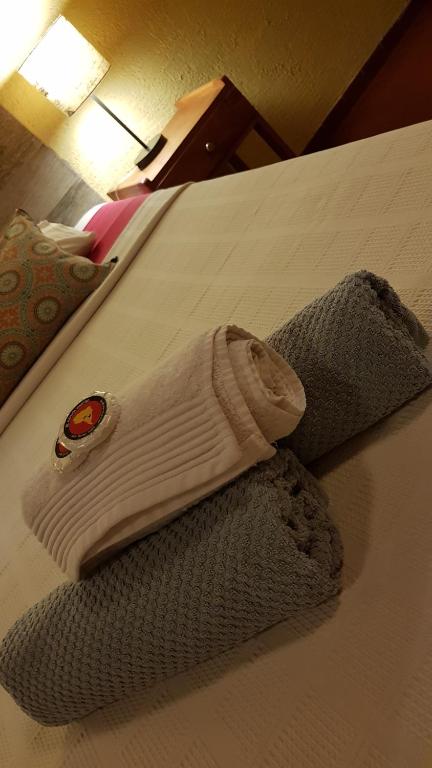 Postel nebo postele na pokoji v ubytování Nomada Hostel