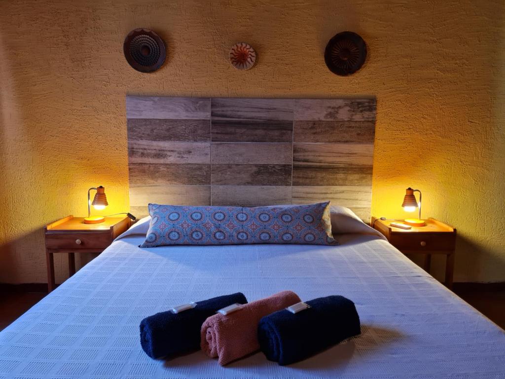 Postel nebo postele na pokoji v ubytování Nomada Hostel