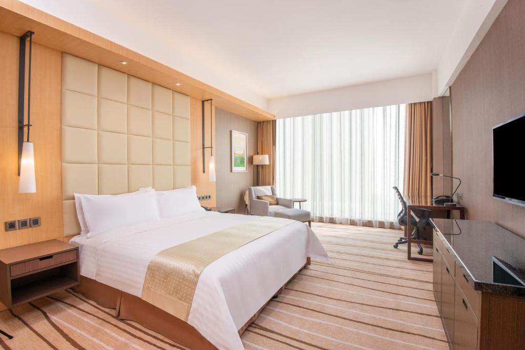 TV a/nebo společenská místnost v ubytování Holiday Inn Putian Xiuyu by IHG