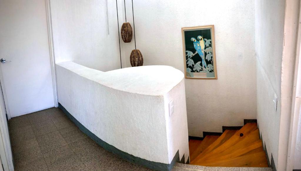 Postel nebo postele na pokoji v ubytování Casa Romantica De Playa