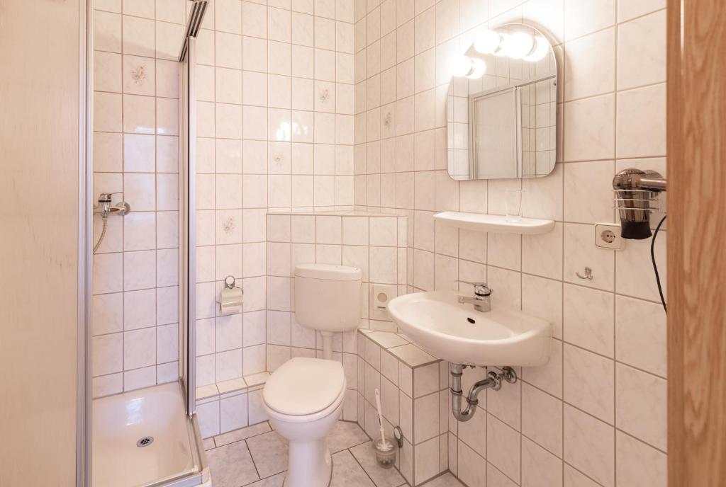 Koupelna v ubytování Hotel Carola