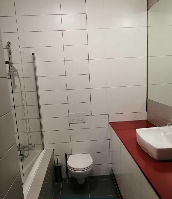 Kúpeľňa v ubytovaní Apartamenty Promenada