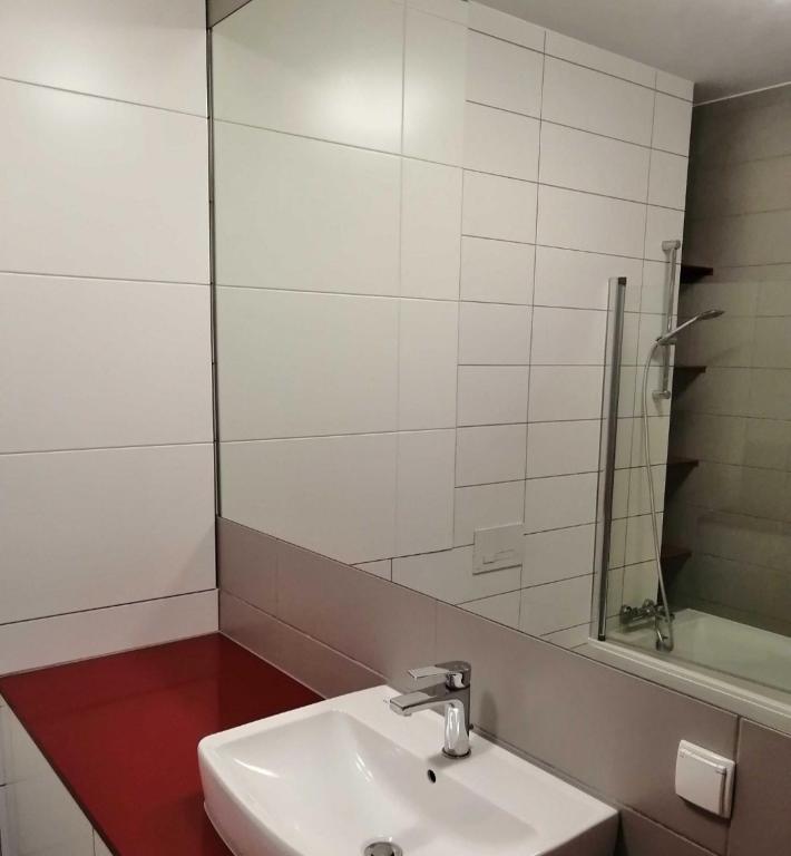 Kúpeľňa v ubytovaní Apartamenty Promenada