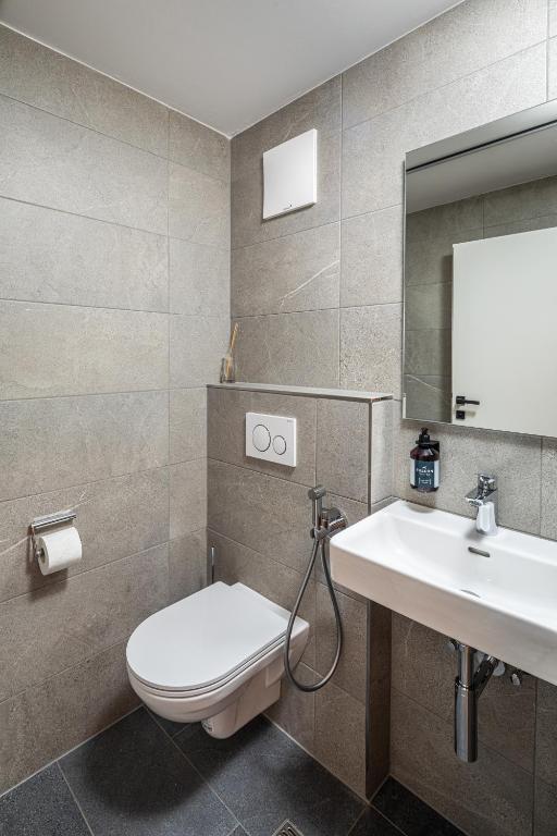حمام في Falcon Suites Kaprun - Summercard included