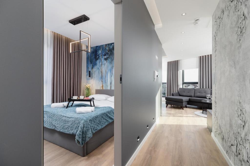 Posteľ alebo postele v izbe v ubytovaní Mogilska Apartments by Renters Prestige