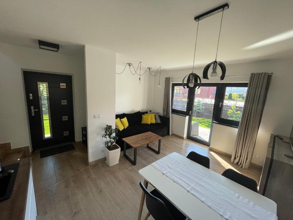 Posedenie v ubytovaní ARKA HOUSE DOMEK WIDOKOWY
