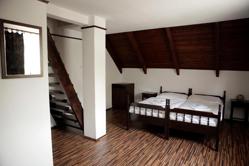 Postel nebo postele na pokoji v ubytování Motel M