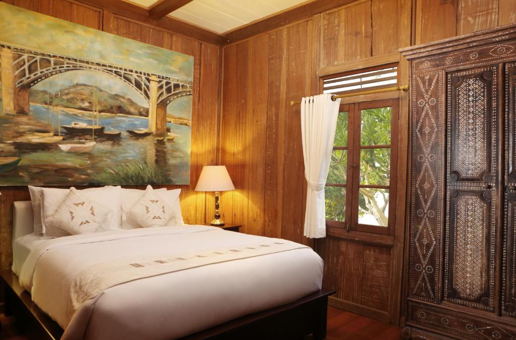 Postel nebo postele na pokoji v ubytování Alindra Villas & Spa