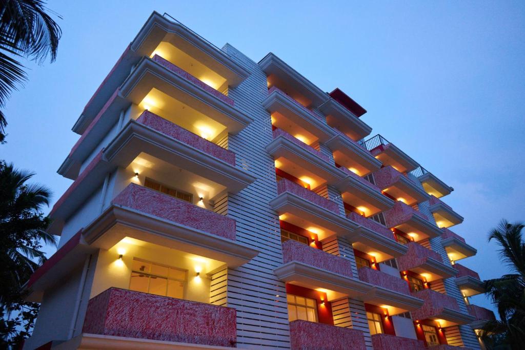 a large building with balconies on the side of it at Martins Crest in Patnem