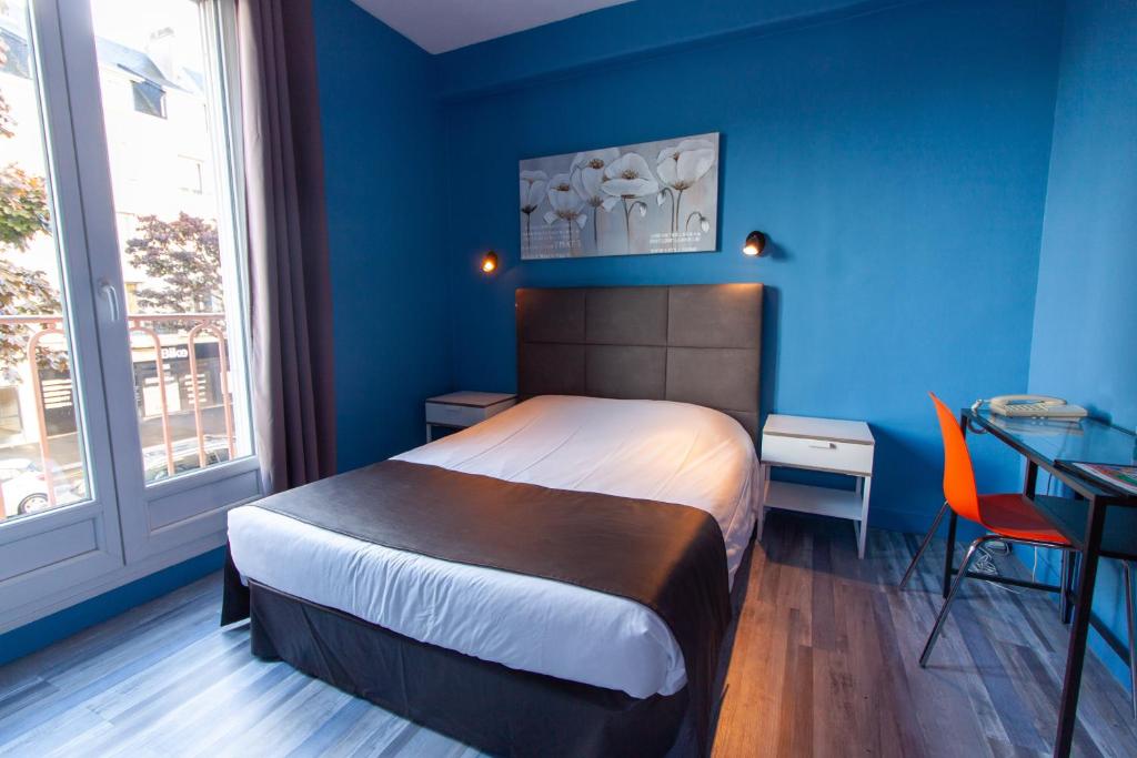 Postel nebo postele na pokoji v ubytování Hotel De l'Univers