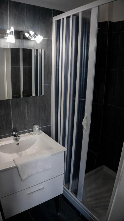Koupelna v ubytování Hotel De l'Univers