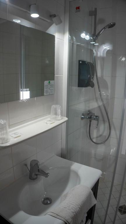 Koupelna v ubytování Hotel De l'Univers