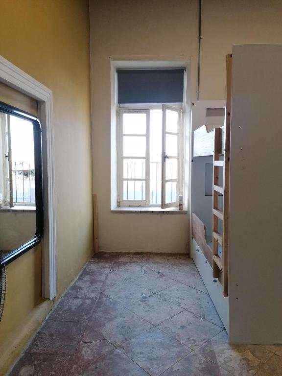 Postel nebo postele na pokoji v ubytování Le Mat Hostel