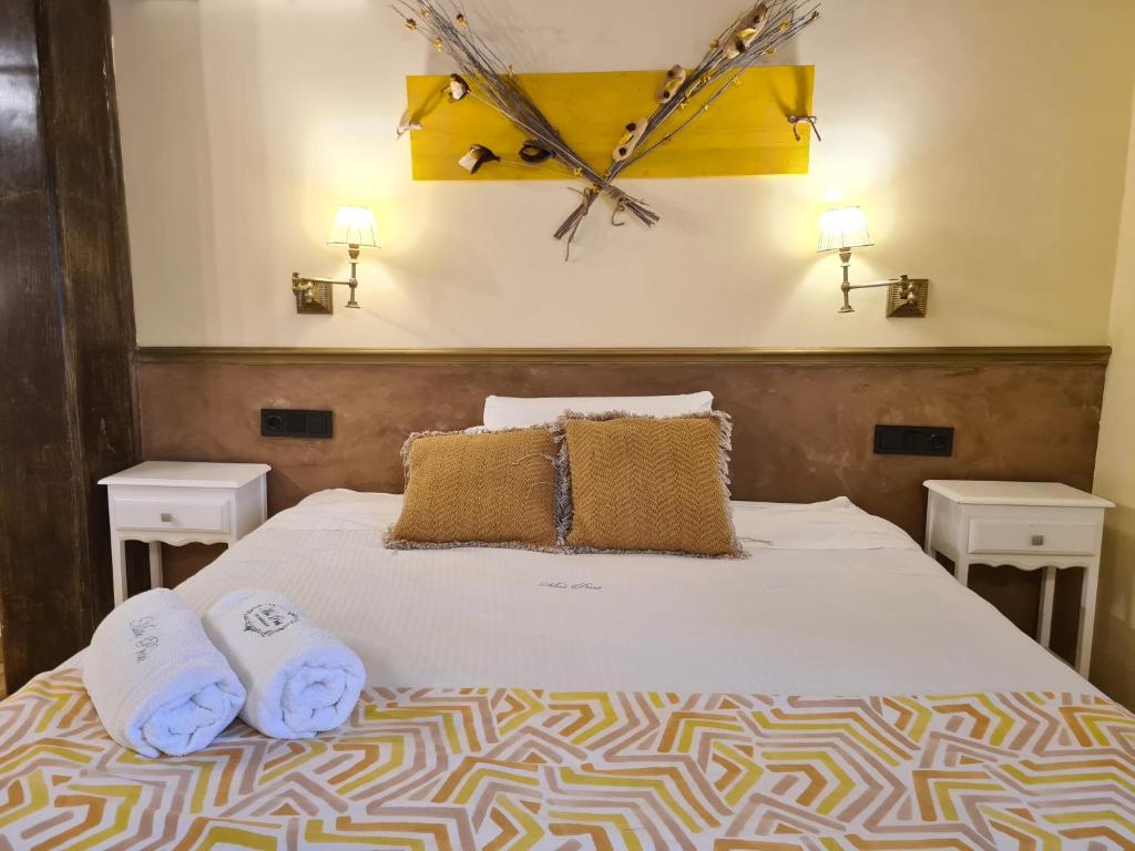 Postel nebo postele na pokoji v ubytování Hotel Rural & Spa Mas Prat