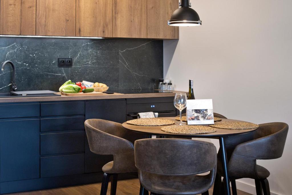 Kuchyňa alebo kuchynka v ubytovaní Marina Mokotow P&O Serviced Apartments