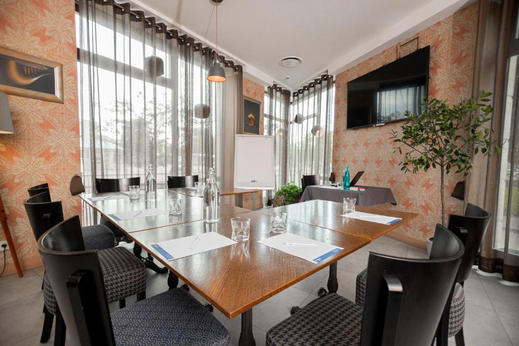 TV a/nebo společenská místnost v ubytování Wellton Riga Hotel & SPA