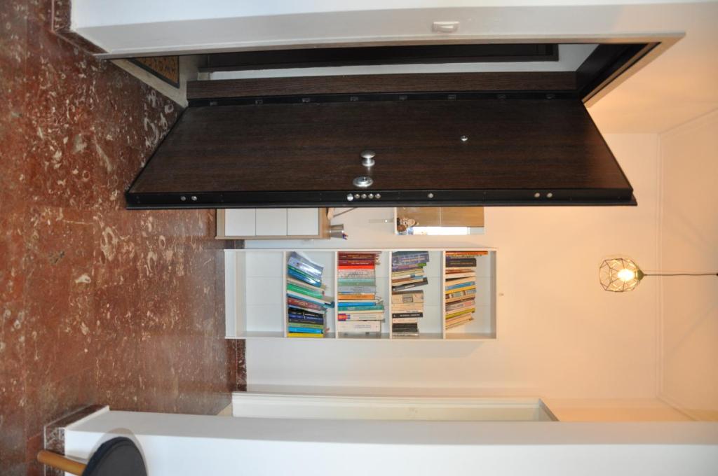 A bathroom at Sunny Apartment with view