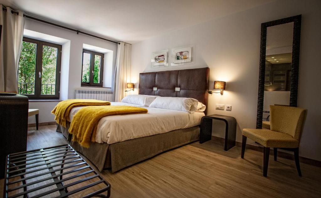 Posteľ alebo postele v izbe v ubytovaní Hotel Pura Vida