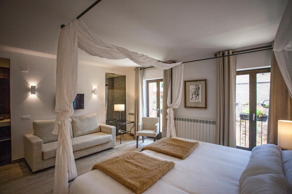 Posteľ alebo postele v izbe v ubytovaní Hotel Pura Vida