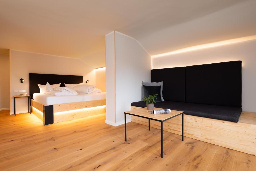 Postel nebo postele na pokoji v ubytování freistil Boutiquehotel