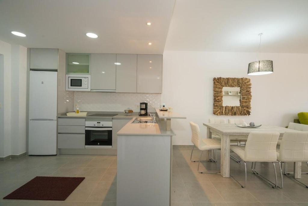 Kuchyň nebo kuchyňský kout v ubytování Apartment Cerezas