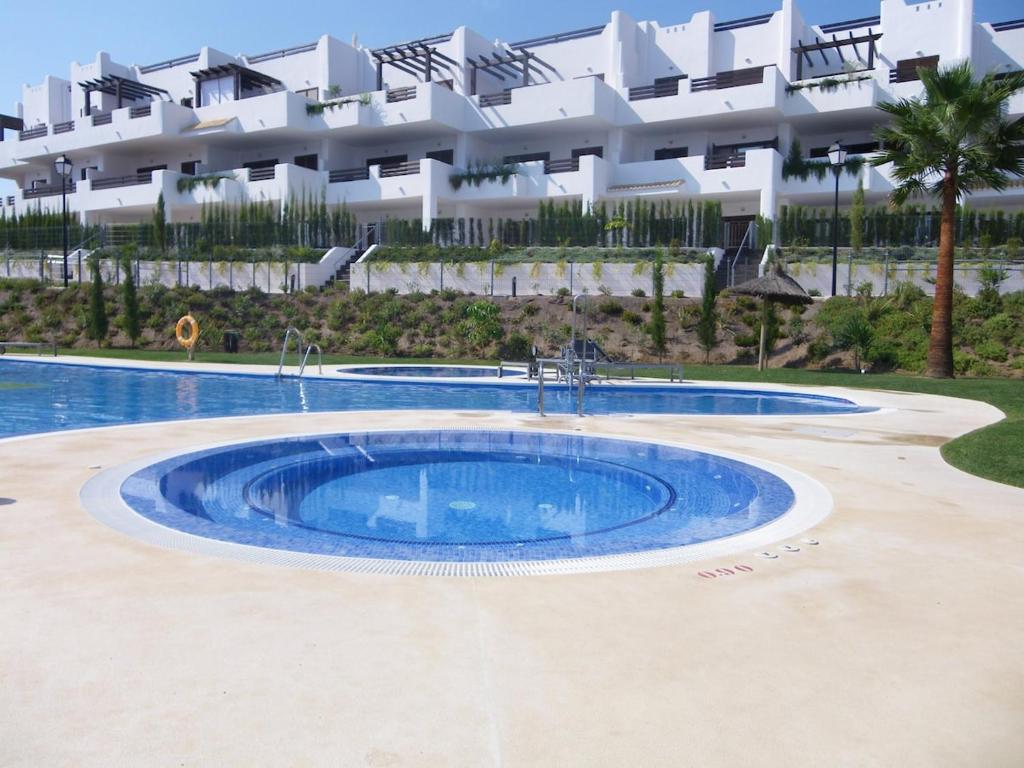 Bazén v ubytování Apartment Cerezas nebo v jeho okolí