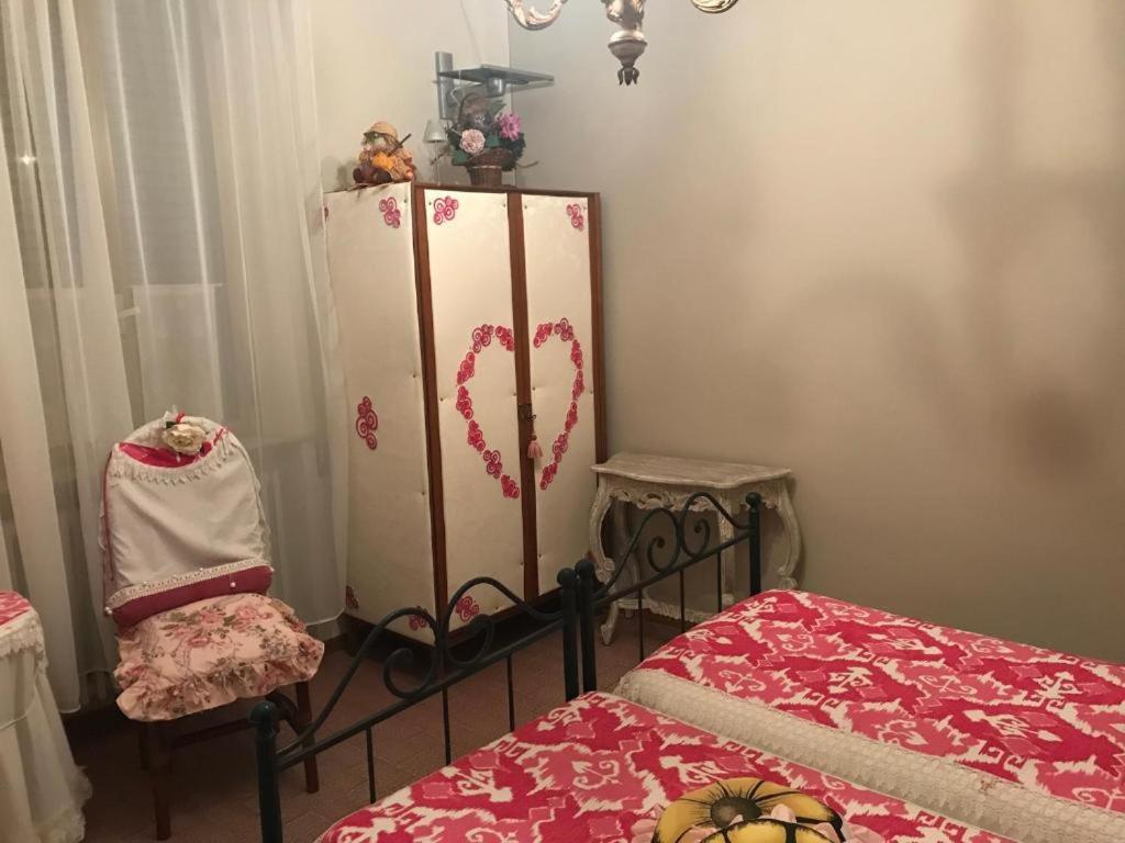 Łóżko lub łóżka w pokoju w obiekcie Affittacamere San Marco