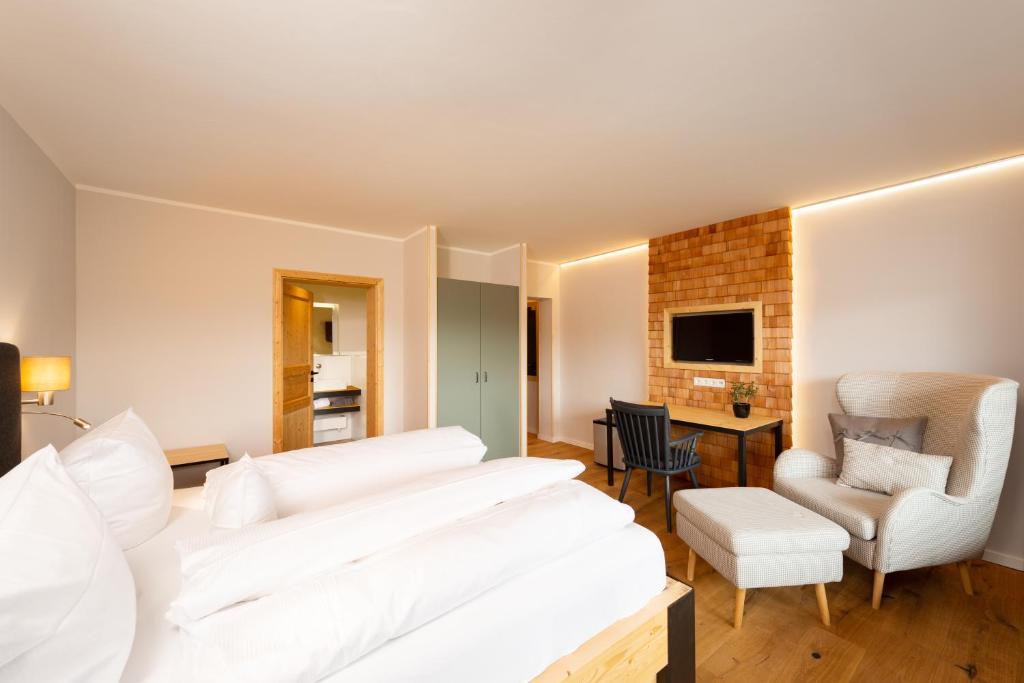 Postel nebo postele na pokoji v ubytování freistil Boutiquehotel