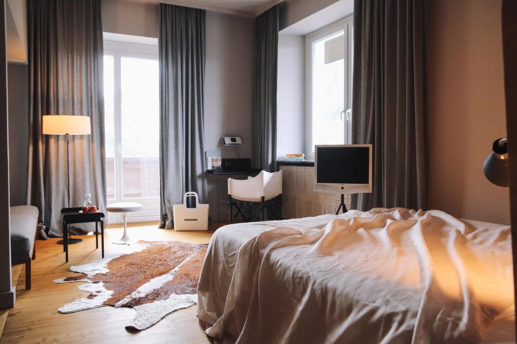 Postel nebo postele na pokoji v ubytování Design Hotel Miramonte