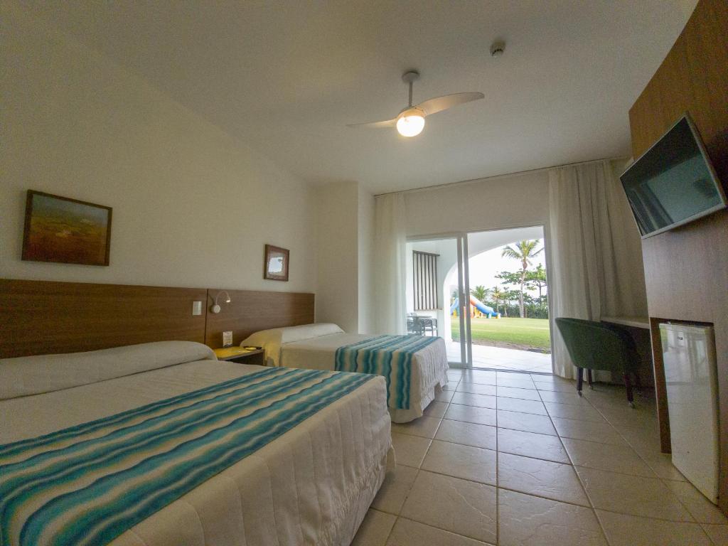 Cama ou camas em um quarto em Beach Hotel Maresias