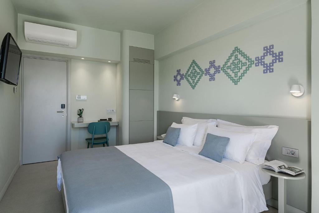 Voodi või voodid majutusasutuse Arkadi Hotel toas