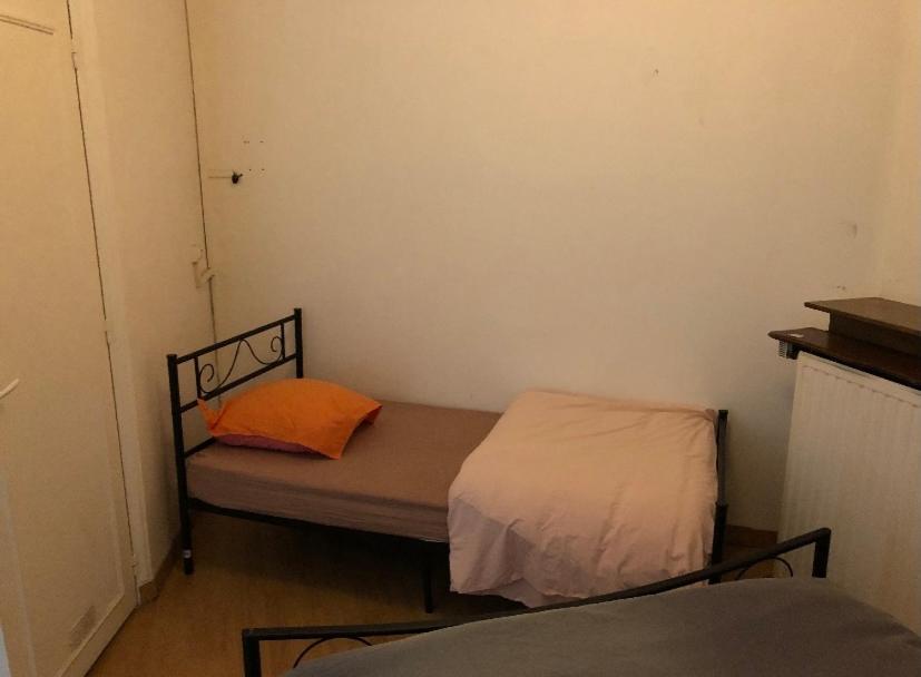 Postel nebo postele na pokoji v ubytování Le studio de Tom