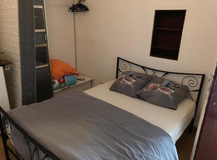 Postel nebo postele na pokoji v ubytování Le studio de Tom