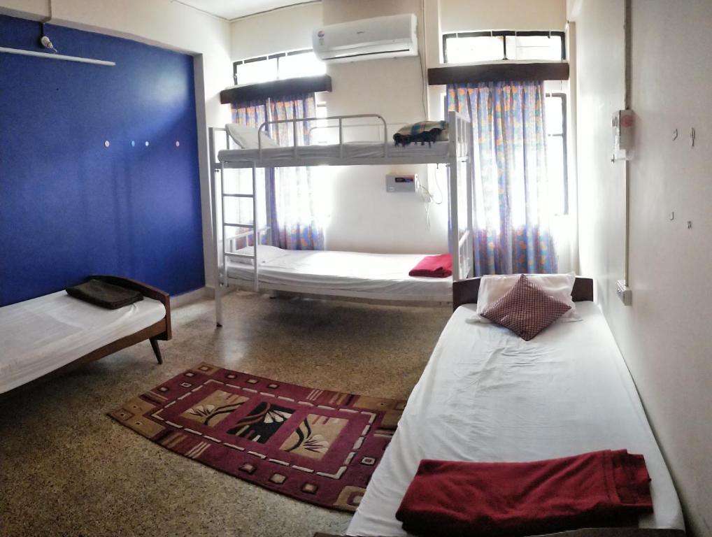 Cama o camas de una habitación en Monkey Mind Hostel
