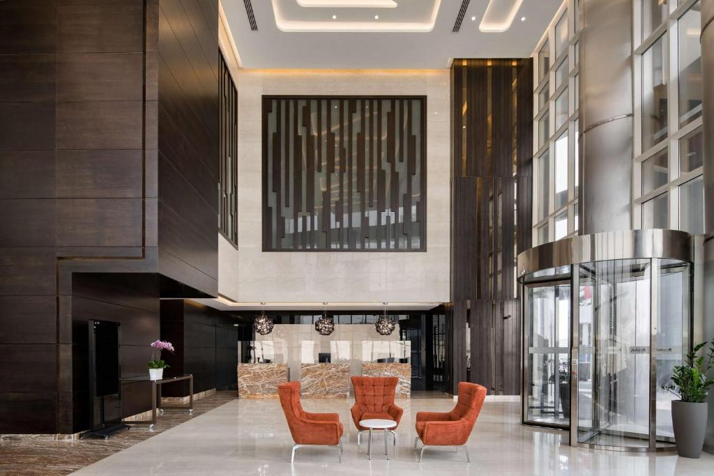 A seating area at Radisson Blu Hotel, Dubai Canal View