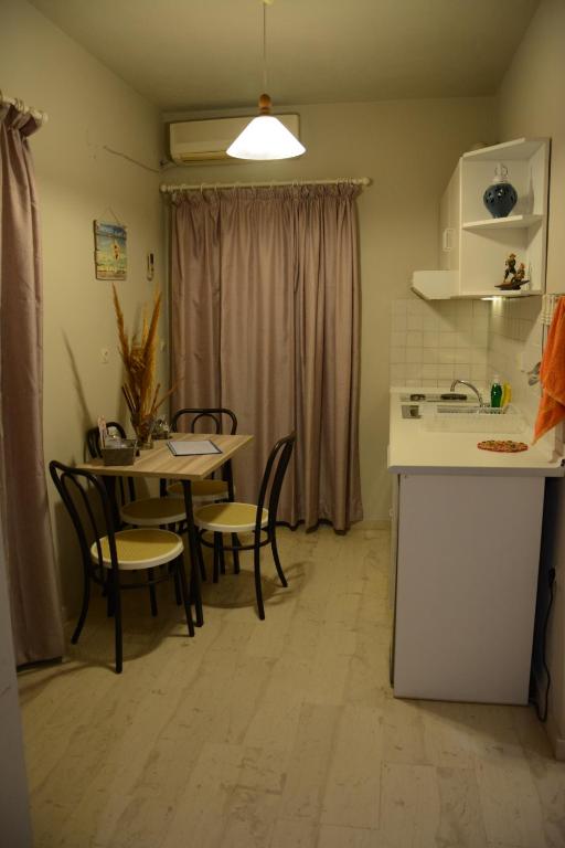Kuchyň nebo kuchyňský kout v ubytování Thalis Rooms
