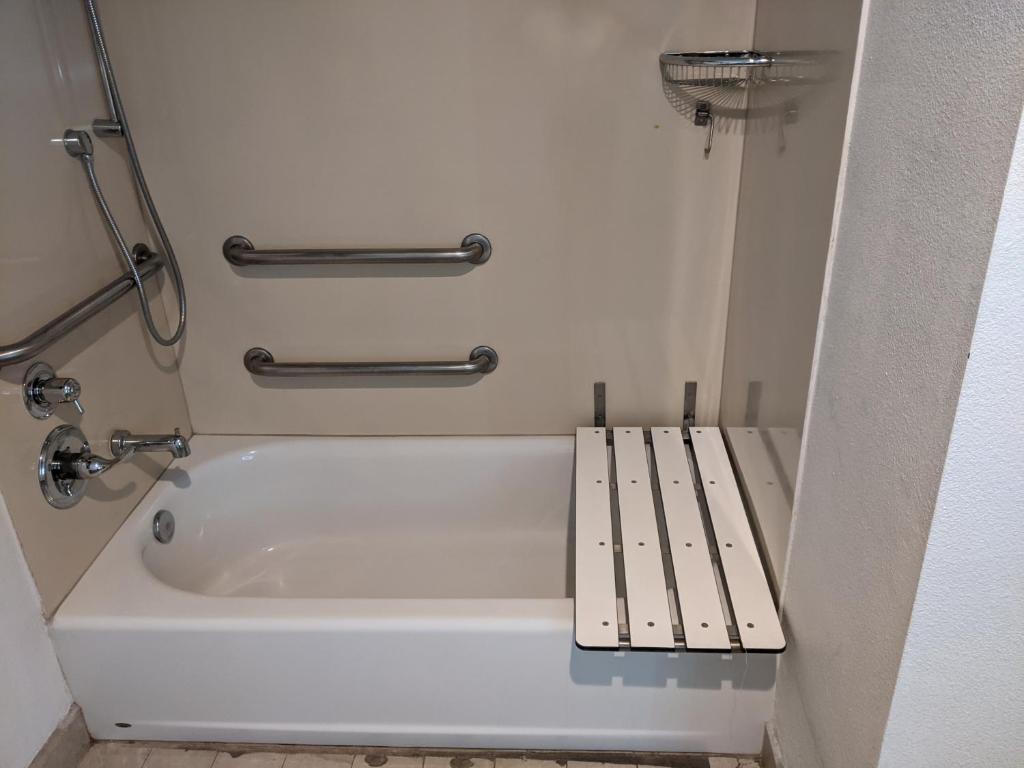 Koupelna v ubytování Epic Hotel