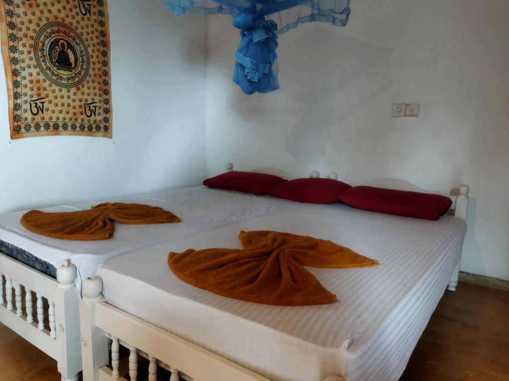 Postel nebo postele na pokoji v ubytování Sunchaser Beach Hotel