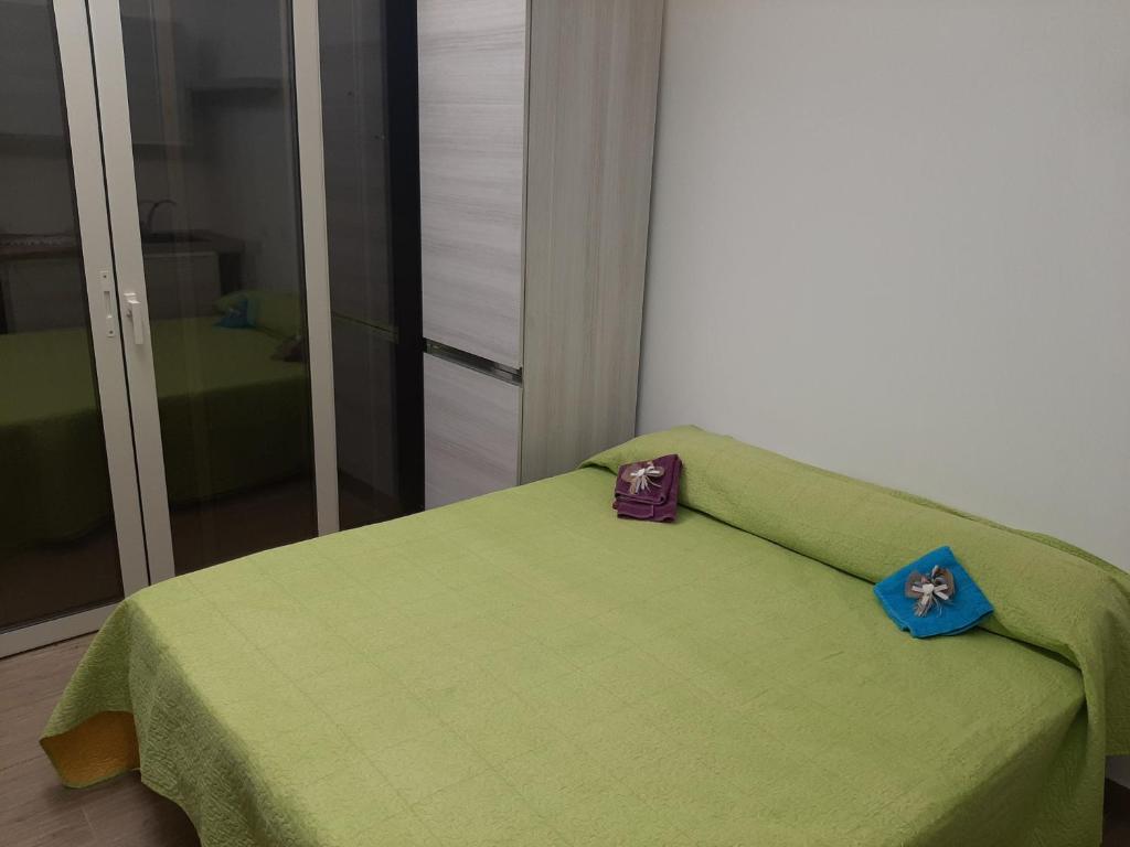 Posteľ alebo postele v izbe v ubytovaní Ciuri Ciuri - sea of Taormina