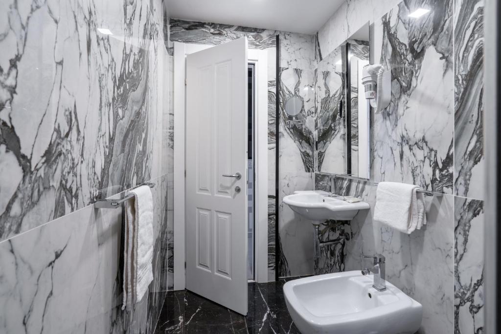Koupelna v ubytování Hotel Spagna