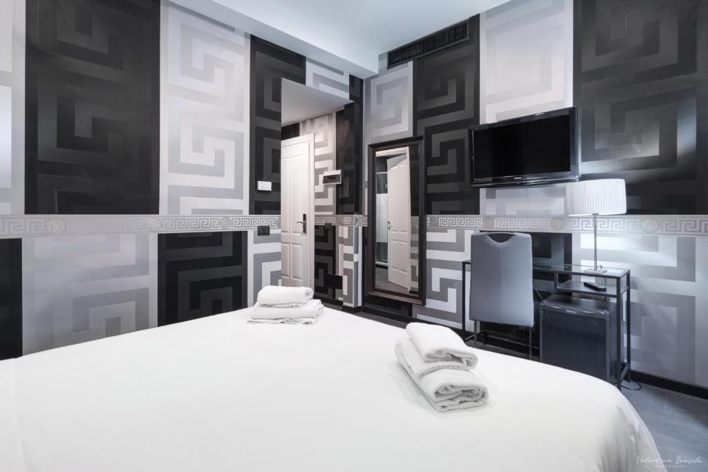 Kuchyň nebo kuchyňský kout v ubytování Hotel Spagna