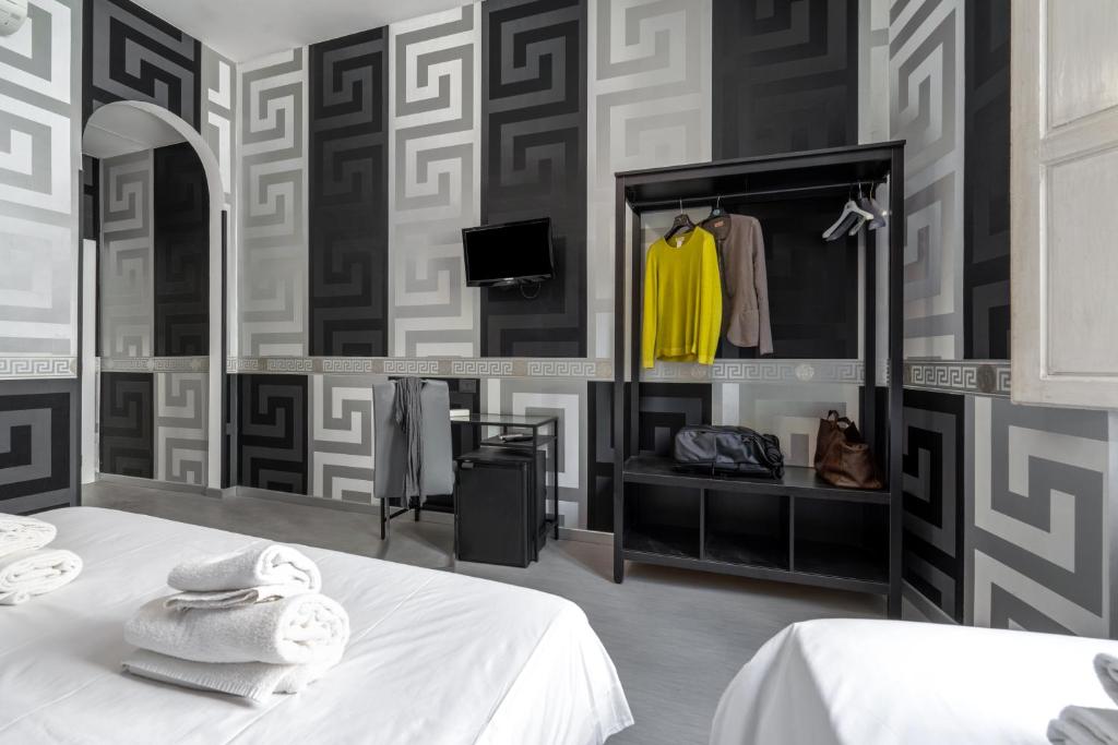 TV a/nebo společenská místnost v ubytování Hotel Spagna