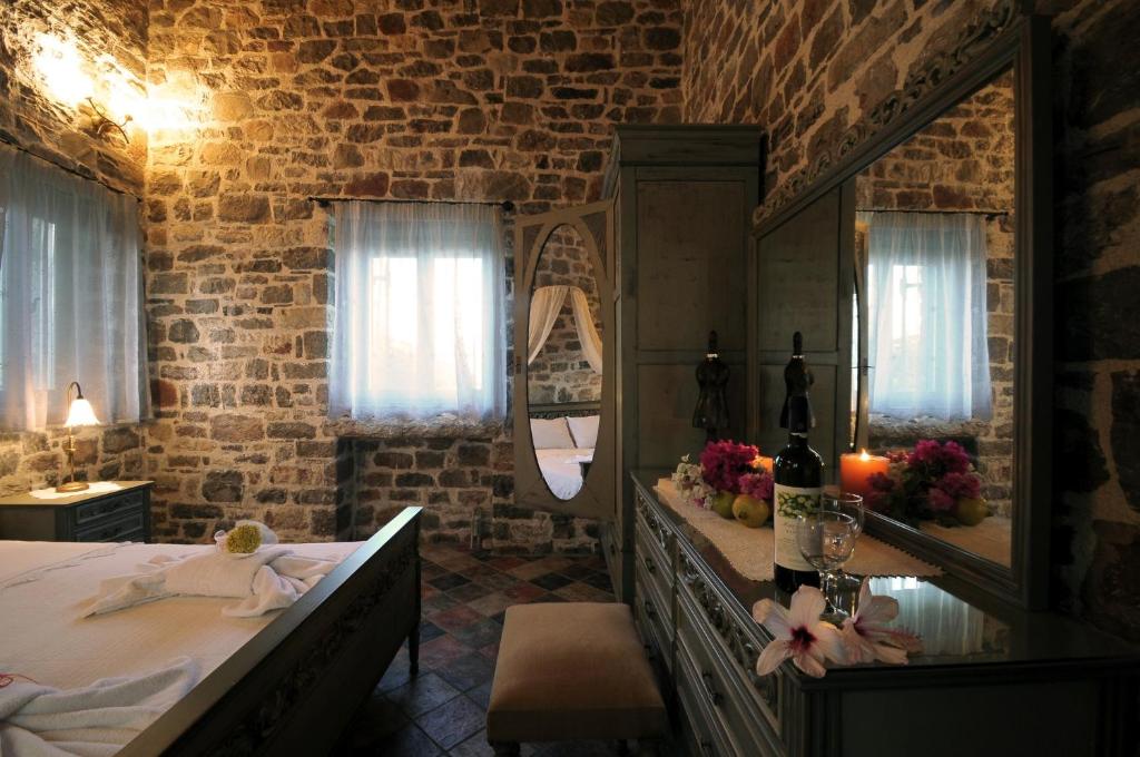 Postel nebo postele na pokoji v ubytování Palaeopoli Villas